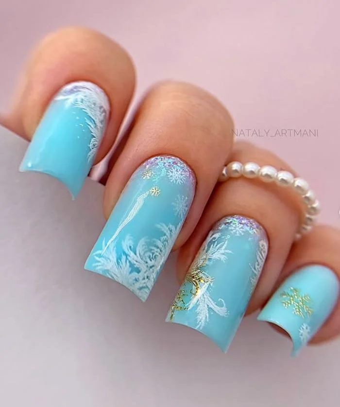 Icy Blue Manicure with winter paitings