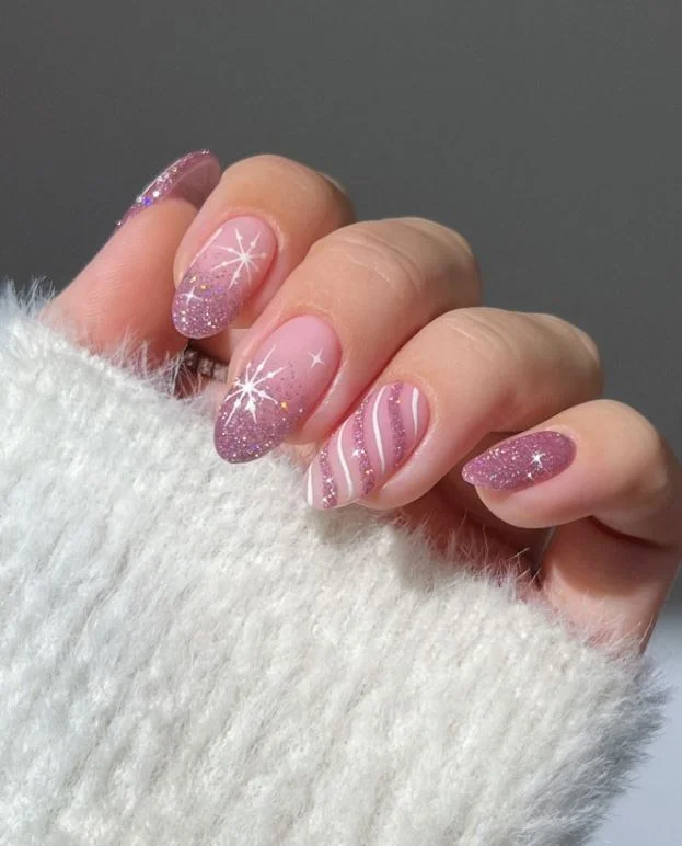 Glitter Christmas manicure with stripes and snowflakes