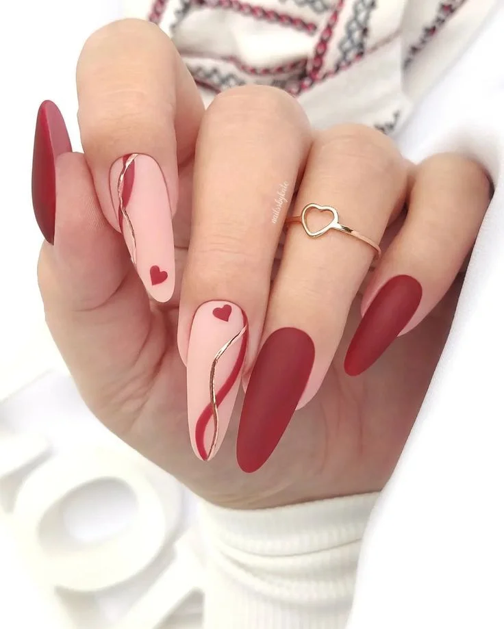 Valentine’s Day nails with red and pink design