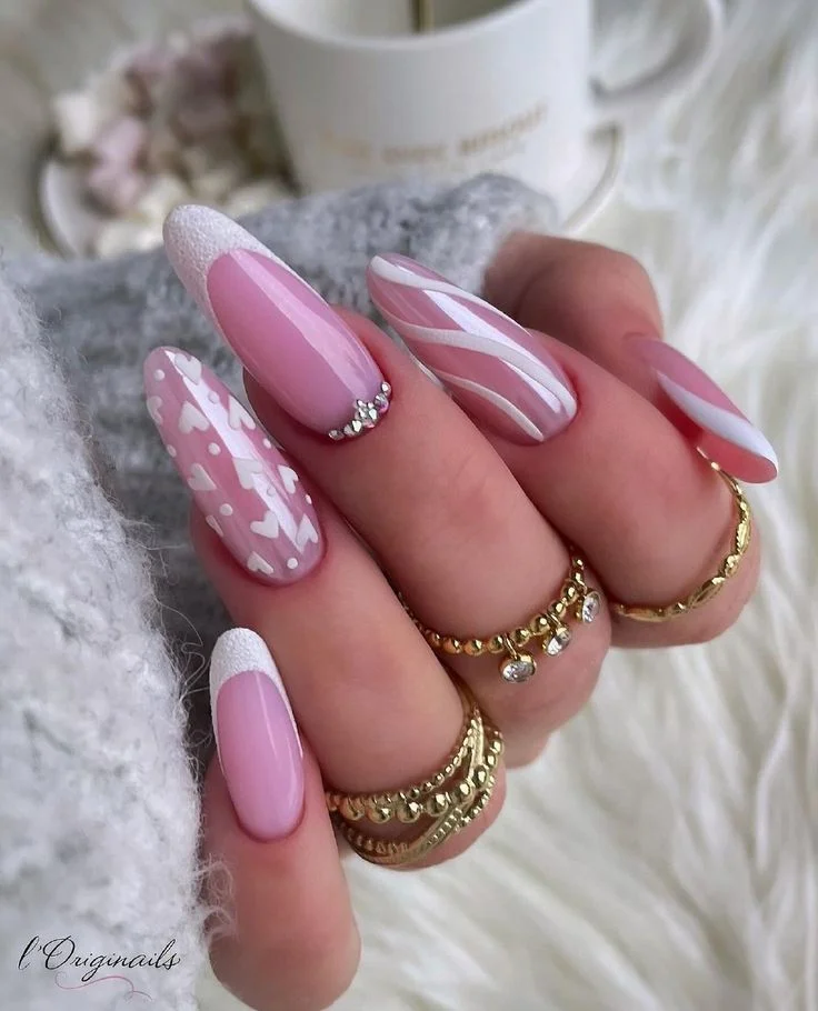 Cute Valentine nail design in pink tones