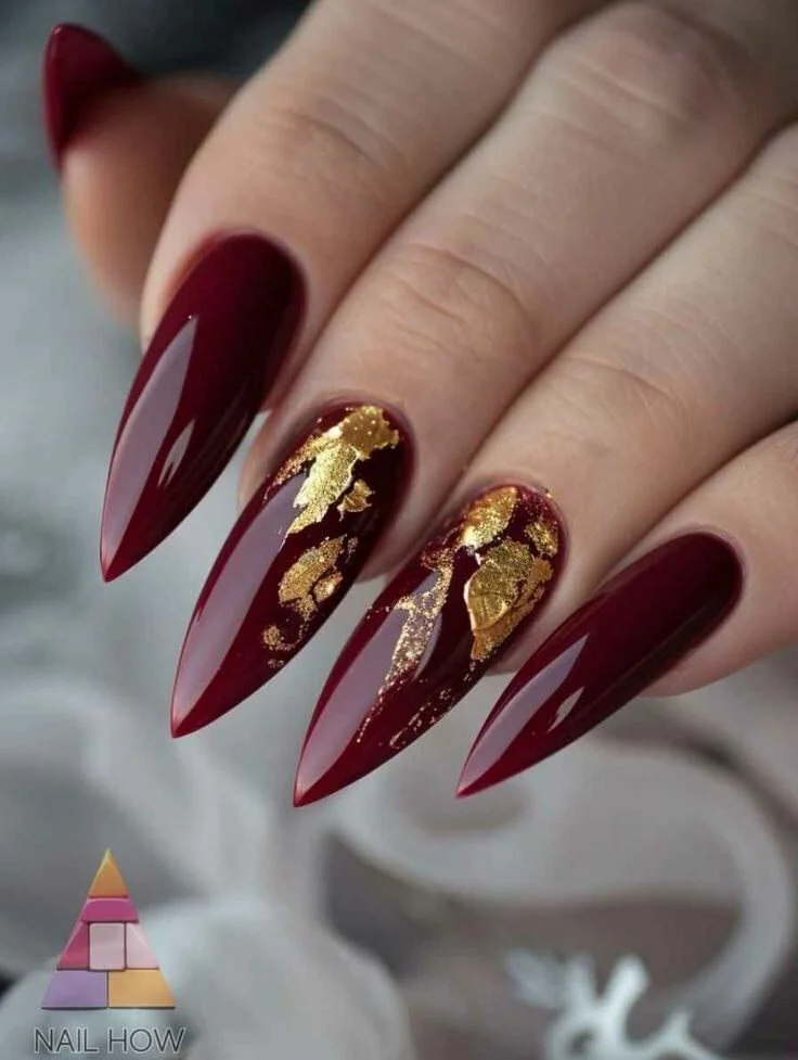 Long Stiletto red nail designs with foil