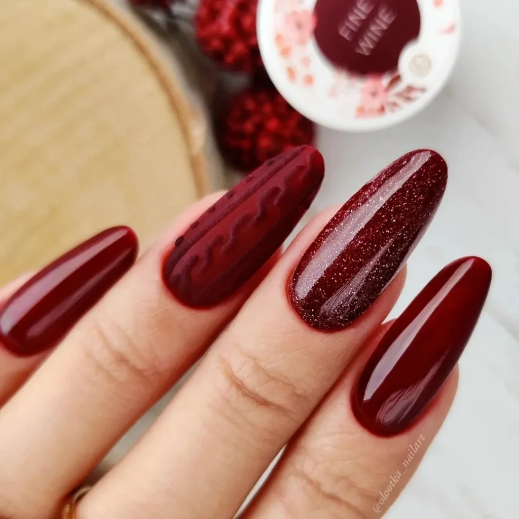 Dark cherry nails with sweater design