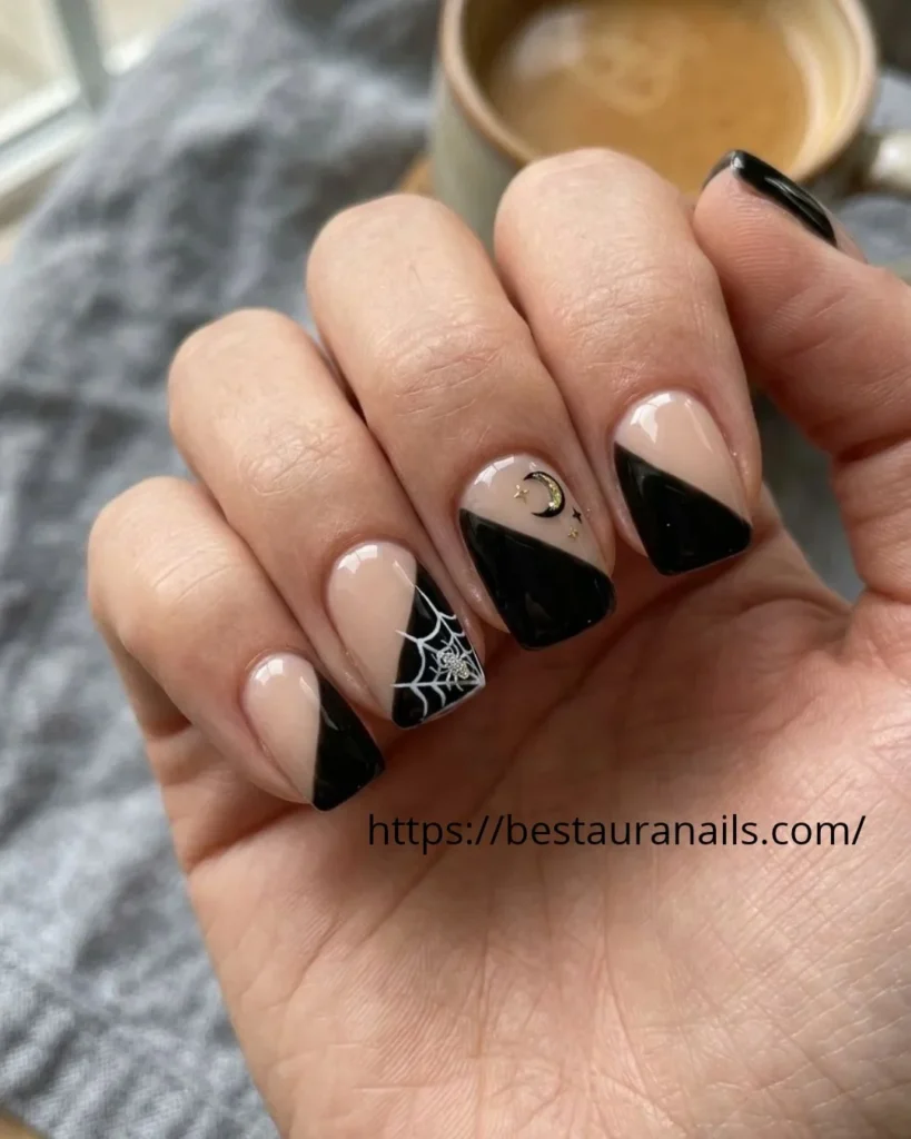 Black and orange square Halloween manicure with split-color details 