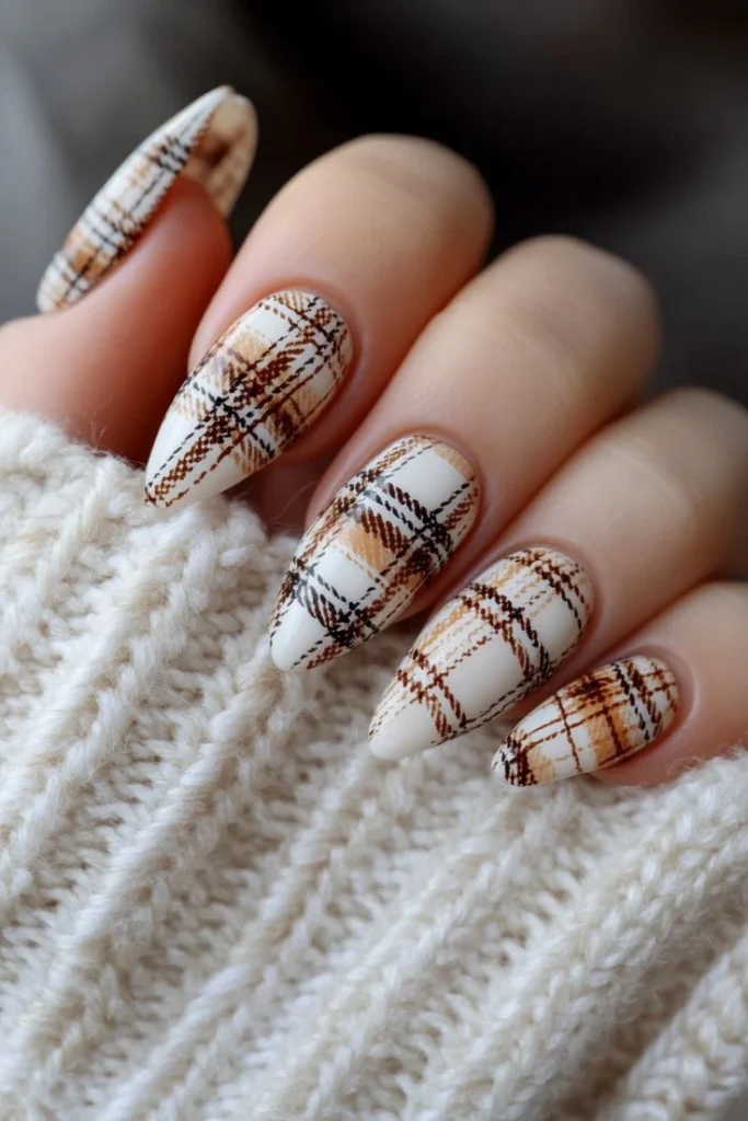Brown and cream plaid manicure with thin ivory stripes